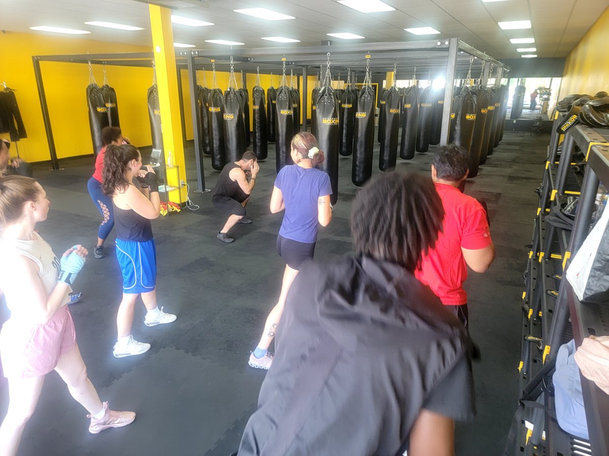 Coach-led group boxing fitness class — employee wellness program Neighborhood Boxing Club Columbus