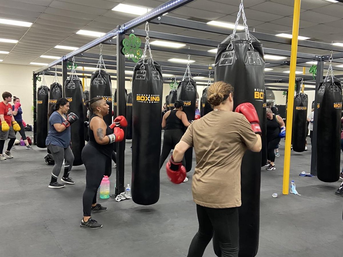 Neighborhood Boxing Club gym — rows of heavy bags at 4324 N High St Clintonville Columbus Ohio