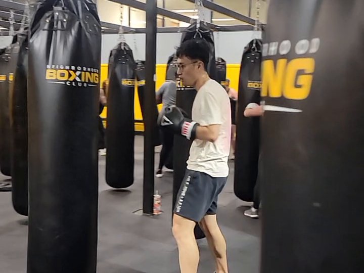 Employees taking a group boxing fitness class at Neighborhood Boxing Club in Columbus Ohio